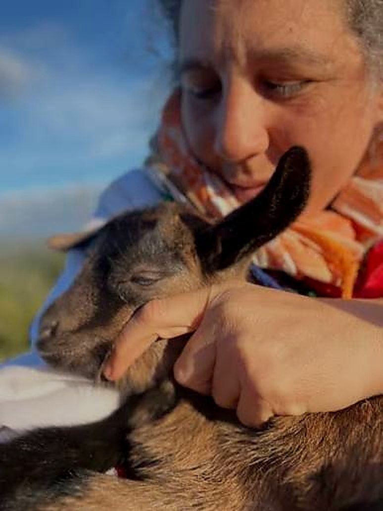 Your host with a newborn goat kid